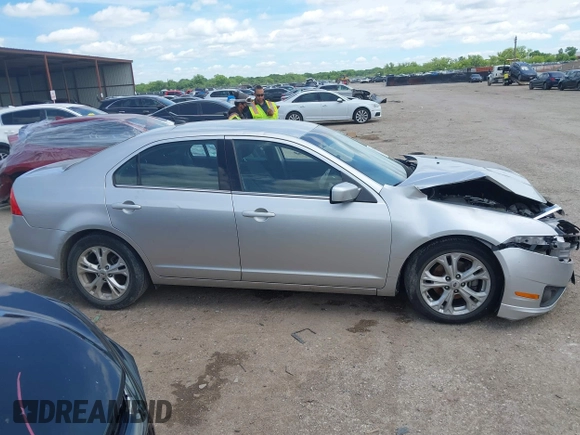 2012 Ford Fusion SE z VIN 3FAHP0HA8CR117122, wystawiony jako IAAI lot #42215141 z przebiegiem 158 703 mil mil oraz . Historia ofert i sprzedaży dostępna na DreamBid. Obrazek 13.