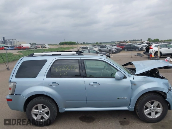 2008 Mercury Mariner z VIN 4M2CU39H98KJ30705, wystawiony jako IAAI lot #42265080 z przebiegiem 60 636 mil mil oraz . Historia ofert i sprzedaży dostępna na DreamBid. Obrazek 13.