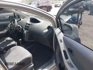 2010 Toyota Yaris with VIN JTDKT4K31A5318793, listed as a IAAI auction lot 39910045 with 192,737 mi miles. Bid and sale history available at carsss.com. Image 5.