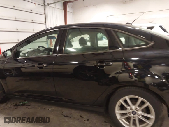 2018 Ford Focus SE with VIN 1FADP3F23JL215479, listed as a IAAI auction lot 41936036 with 96,560 mi miles. Bid and sale history available at carsss.com. Image 15.