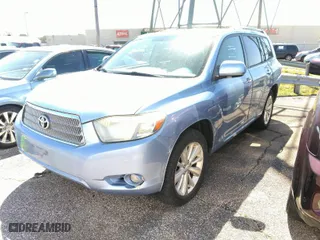 2009 Toyota Highlander Hybrid Limited with VIN JTEEW44A392028371, listed as a IAAI auction lot 41826565 with 210,309 mi miles. Bid and sale history available at carsss.com. Image 2.