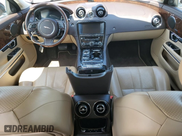 2014 Jaguar XJ with VIN SAJWA1CZ3E8V69877, listed as a Copart auction lot 51520405 with 57,567 mi miles and Clean Title. Bid and sale history available at DreamBid. Image 8.