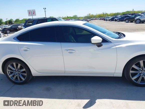 2021 Mazda 6 Touring with VIN JM1GL1VM4M1618686, listed as a IAAI auction lot 42079730 with 55,539 mi miles and . Bid and sale history available at DreamBid. Image 13.