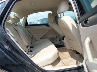 2014 Volkswagen Passat SE z VIN 1VWBT7A38EC039956, wystawiony jako IAAI lot #42479286 z przebiegiem 157 579 mil mil oraz . Historia ofert i sprzedaży dostępna na DreamBid. Obrazek 8.