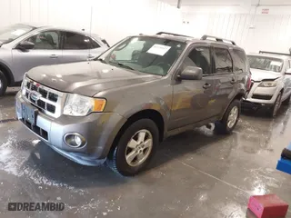 2010 Ford Escape XLT with VIN 1FMCU0D75AKA12803, listed as a IAAI auction lot 41339117 with 175,580 mi miles. Bid and sale history available at carsss.com. Image 2.