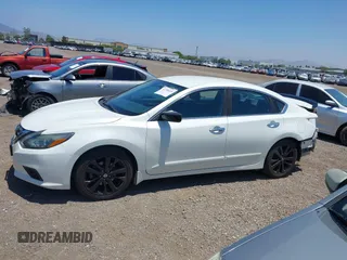 2017 Nissan Altima SV with VIN 1N4AL3AP3HC169177, listed as a IAAI auction lot 42396609 with 92,601 mi miles and . Bid and sale history available at DreamBid. Image 15.