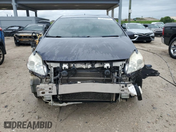 2015 Toyota Prius Four z VIN JTDKN3DU4F0410964, wystawiony jako Copart lot #59362255 z przebiegiem 239 594 mil mil oraz Czysty tytuł • Clean title. Historia ofert i sprzedaży dostępna na DreamBid. Obrazek 5.