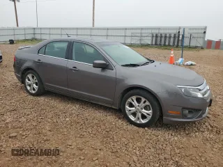2012 Ford Fusion SE with VIN 3FAHP0HA7CR317179, listed as a Copart auction lot 60606575 with 148,766 mi miles and Clean title. Bid and sale history available at DreamBid. Image 4.