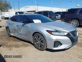 2021 Nissan Maxima SV with VIN 1N4AA6CV0MC501153, listed as a IAAI auction lot 41650382 with 56,686 mi miles and . Bid and sale history available at DreamBid. Image 1.