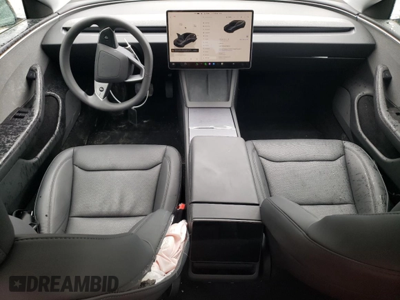 2024 Tesla Model 3 with VIN 5YJ3E1EA7RF858716, listed as a Copart auction lot 49809325 with 9,936 mi miles and Non Repairable. Bid and sale history available at DreamBid. Image 8.