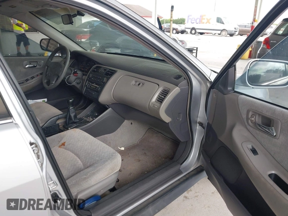2001 Honda Accord LX with VIN 1HGCG55401A063548, listed as a IAAI auction lot 42651792 with 215,058 mi miles and . Bid and sale history available at DreamBid. Image 5.