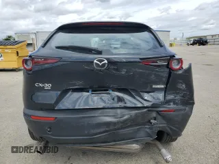 2023 Mazda CX-30 S with VIN 3MVDMBAM7PM555455, listed as a Copart auction lot 51268345 with 34,552 mi miles and Salvage Title. Bid and sale history available at carsss.com. Image 6.