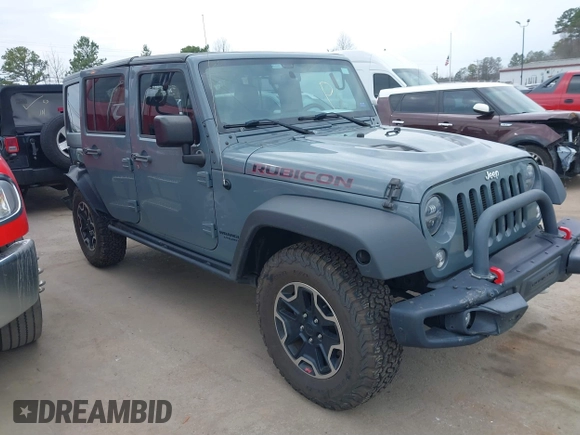 2015 Jeep Wrangler Unlimited Rubicon Hard Rock z VIN 1C4HJWFG1FL679873, wystawiony jako IAAI lot #41508722 z przebiegiem 97 165 mil mil oraz . Historia ofert i sprzedaży dostępna na DreamBid. Obrazek 1.