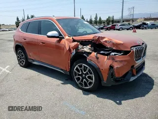 2023 BMW X1 xDrive28i with VIN WBX73EF03P5W54209, listed as a Copart auction lot 64796365 with 19,591 mi miles and Salvage title. Bid and sale history available at DreamBid. Image 14.