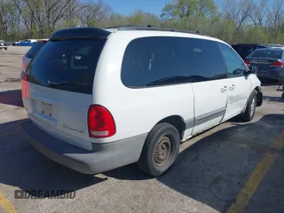 1999 Dodge Caravan Sport with VIN 2B4GP44RXXR196682, listed as a IAAI auction lot 41958452 with 231,685 mi miles and . Bid and sale history available at carsss.com. Image 4.