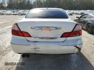 2005 Infiniti Q45 z VIN JNKBF01A85M100070, wystawiony jako Copart lot #82127494 z przebiegiem 176 578 mil mil oraz Szkoda całkowita • Salvage title. Historia ofert i sprzedaży dostępna na DreamBid. Obrazek 6.