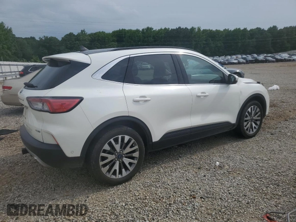 2020 Ford Escape Titanium z VIN 1FMCU9J9XLUB57675, wystawiony jako Copart lot #57777795 z przebiegiem Nie podano mil oraz Szkoda całkowita • Salvage title. Historia ofert i sprzedaży dostępna na DreamBid. Obrazek 3.