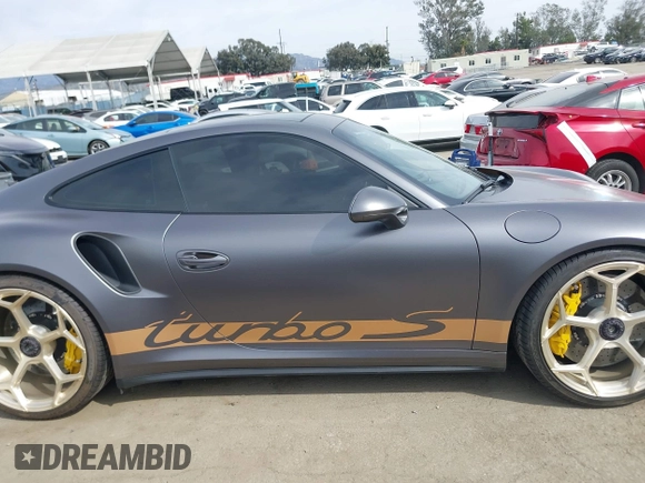 2015 Porsche 911 Turbo S with VIN WP0AD2A92FS166616, listed as a IAAI auction lot 41688055 with 38,345 mi miles. Bid and sale history available at carsss.com. Image 14.