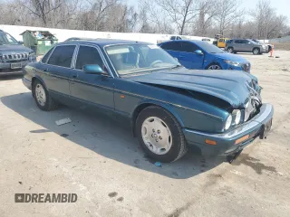 1996 Jaguar XJ z VIN SAJHX1746TC756451, wystawiony jako Copart lot #48991655 z przebiegiem 115 015 mil mil oraz Szkoda całkowita • Salvage title. Historia ofert i sprzedaży dostępna na DreamBid. Obrazek 4.