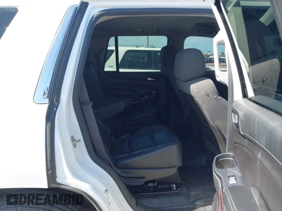 2015 Chevrolet Tahoe Commercial z VIN 1GNLC2EC8FR255526, wystawiony jako IAAI lot #42538320 z przebiegiem 165 502 mil mil oraz . Historia ofert i sprzedaży dostępna na DreamBid. Obrazek 8.