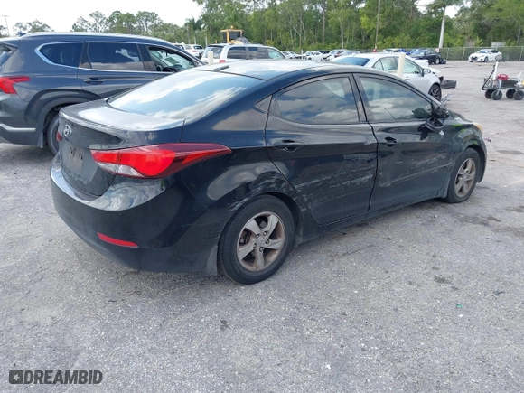 2015 Hyundai Elantra Limited with VIN KMHDH4AE7FU385081, listed as a IAAI auction lot 41911165 with 124,052 mi miles. Bid and sale history available at carsss.com. Image 4.