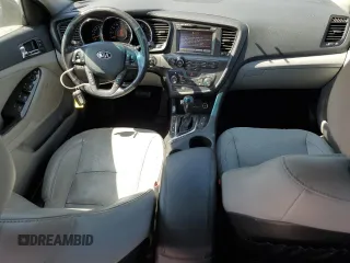 2013 Kia Optima EX z VIN 5XXGN4A71DG197381, wystawiony jako Copart lot #53619615 z przebiegiem 100 873 mil mil oraz Szkoda całkowita • Salvage title. Historia ofert i sprzedaży dostępna na DreamBid. Obrazek 8.