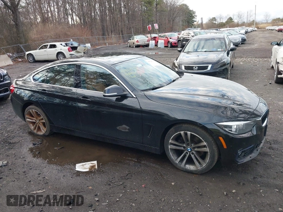 2018 BMW 4 Series 430i xDrive with VIN WBA4J3C56JBG91516, listed as a IAAI auction lot 41824273 with 102,932 mi miles and . Bid and sale history available at DreamBid. Image 13.