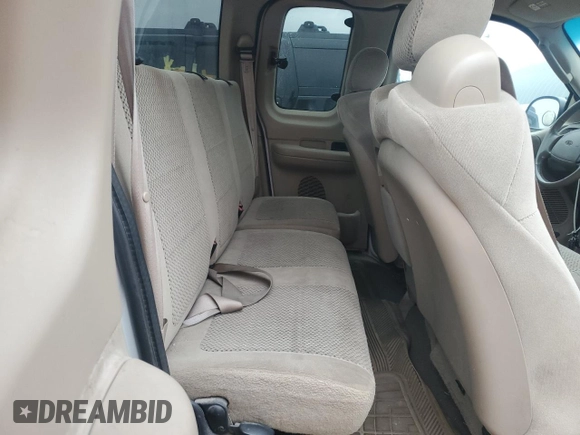 2002 Ford F-150 XL with VIN 1FTRX17L52KC49698, listed as a Copart auction lot 54307145 with 254,394 mi miles and Salvage title. Bid and sale history available at DreamBid. Image 10.