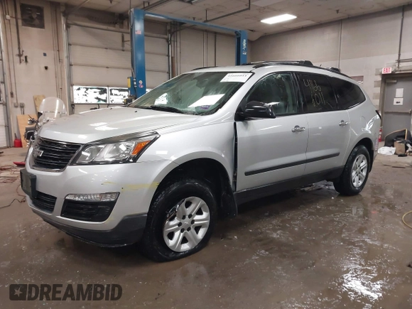2013 Chevrolet Traverse LS with VIN 1GNKVFKD7DJ138235, listed as a IAAI auction lot 41666011 with 134,731 mi miles and . Bid and sale history available at DreamBid. Image 2.