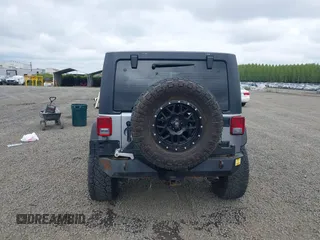 2018 Jeep Wrangler Unlimited Sport S with VIN 1C4BJWDG4JL861052, listed as a IAAI auction lot 42100517 with 43,907 mi miles and . Bid and sale history available at DreamBid. Image 17.