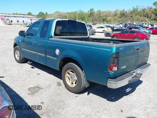1998 Ford F-150 z VIN 1FTZX1725WNA75420, wystawiony jako IAAI lot #41775998 z przebiegiem 201 604 mil mil oraz . Historia ofert i sprzedaży dostępna na DreamBid. Obrazek 3.