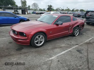 2006 Ford Mustang GT Deluxe with VIN 1ZVFT82H665146396, listed as a Copart auction lot 55845535 with 103,776 mi miles and Salvage title. Bid and sale history available at DreamBid. Image 1.