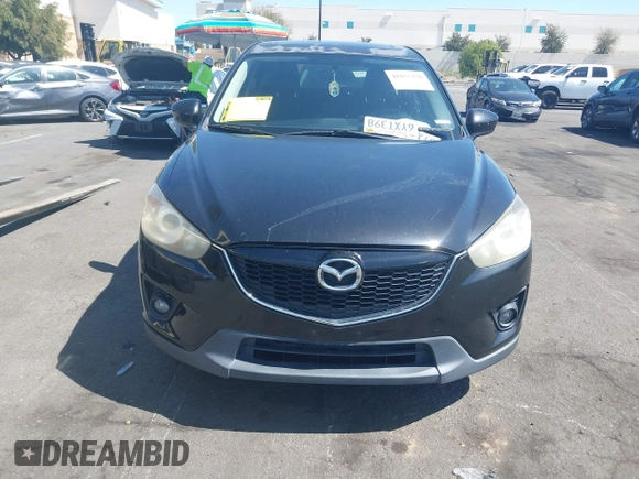 2013 Mazda CX-5 Touring with VIN JM3KE2CEXD0153589, listed as a IAAI auction lot 41855356 with 86,030 mi miles and . Bid and sale history available at DreamBid. Image 12.