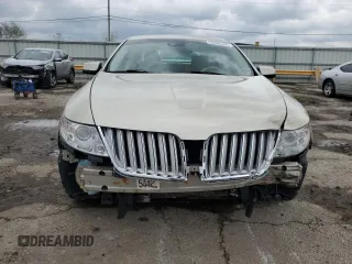 2011 Lincoln MKS z VIN 1LNHL9DR1BG608963, wystawiony jako Copart lot #55390335 z przebiegiem 162 383 mil mil oraz Szkoda całkowita • Salvage title. Historia ofert i sprzedaży dostępna na DreamBid. Obrazek 5.