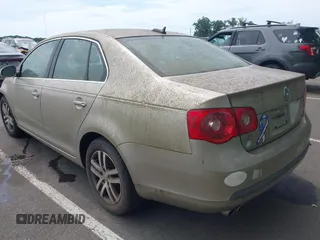 2006 Volkswagen Jetta 2.5L z VIN 3VWSF71K76M750076, wystawiony jako IAAI lot #42769137 z przebiegiem 99 114 mil mil oraz . Historia ofert i sprzedaży dostępna na DreamBid. Obrazek 3.