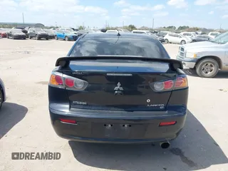 2016 Mitsubishi Lancer GT with VIN JA32U8FW8GU011501, listed as a IAAI auction lot 41779016 with 153,082 mi miles. Bid and sale history available at carsss.com. Image 16.