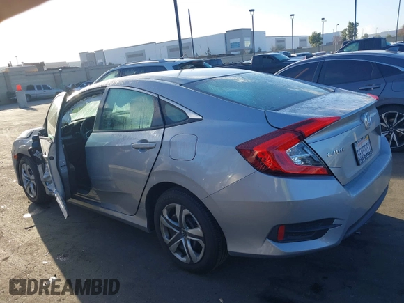 2018 Honda Civic LX with VIN 2HGFC2F58JH571072, listed as a IAAI auction lot 41684450 with 66,032 mi miles and . Bid and sale history available at carsss.com. Image 14.