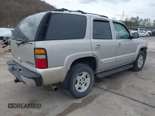2004 Chevrolet Tahoe LS with VIN 1GNEK13Z74J181914, listed as a IAAI auction lot 41881310 with 213,223 mi miles. Bid and sale history available at carsss.com. Image 4.