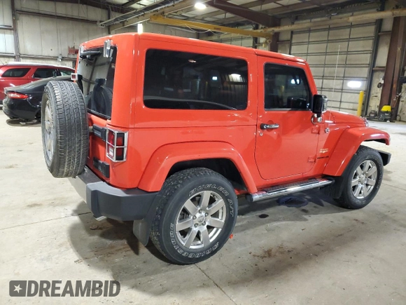 2013 Jeep Wrangler Sahara z VIN 1C4AJWBG2DL569838, wystawiony jako Copart lot #54705065 z przebiegiem 67 093 mil mil oraz Szkoda całkowita • Salvage title. Historia ofert i sprzedaży dostępna na DreamBid. Obrazek 3.
