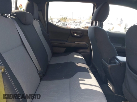 2020 Toyota Tacoma SR5 with VIN 3TMCZ5AN3LM320411, listed as a IAAI auction lot 41838498 with 50,252 mi miles and . Bid and sale history available at DreamBid. Image 8.
