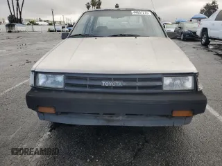1987 Toyota Corolla с VIN JT2AE82E9H3531391, выставлен на аукционе Copart как лот 44657375 с пробегом 240 376 миль миль и Чистый • Clean title. История ставок и продаж доступна на DreamBid. Изображение 5.