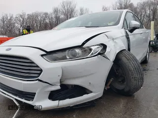2015 Ford Fusion S with VIN 3FA6P0G70FR219905, listed as a IAAI auction lot 41228828 with 62,030 mi miles and . Bid and sale history available at carsss.com. Image 6.