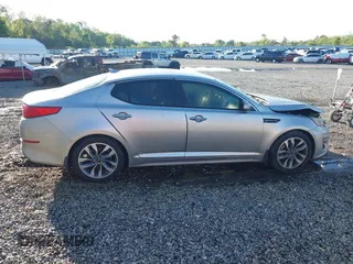 2015 Kia Optima SX z VIN 5XXGR4A72FG419739, wystawiony jako IAAI lot #41972453 z przebiegiem 204 336 mil mil oraz . Historia ofert i sprzedaży dostępna na DreamBid. Obrazek 13.