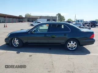 2001 Lexus LS 430 z VIN JTHBN30F810045610, wystawiony jako IAAI lot #42004279 z przebiegiem 143 497 mil mil oraz . Historia ofert i sprzedaży dostępna na DreamBid. Obrazek 13.