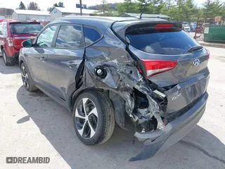 2016 Hyundai Tucson Sport with VIN KM8J33A2XGU022633, listed as a IAAI auction lot 41990348 with 73,395 mi miles. Bid and sale history available at carsss.com. Image 6.