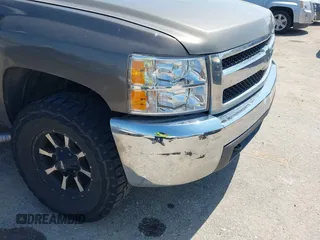 2013 Chevrolet Silverado 1500 LS with VIN 3GCPKREA2DG208400, listed as a IAAI auction lot 41874892 with 120,462 mi miles and . Bid and sale history available at DreamBid. Image 6.