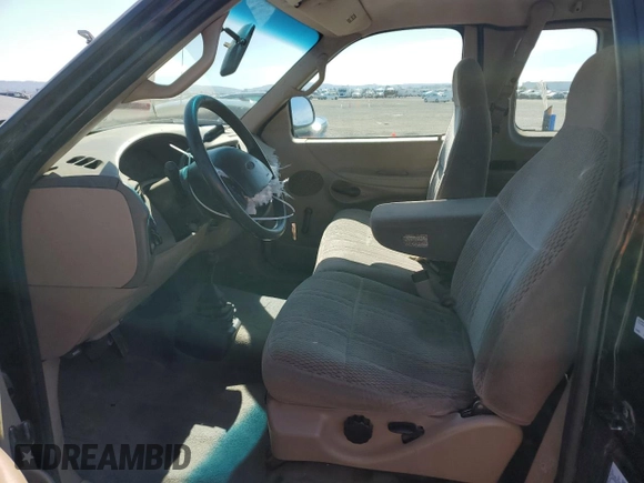 1998 Ford F-150 с VIN 1FTZX18W4WKA79557, выставлен на аукционе Copart как лот 48406375 с пробегом 192 577 миль миль и Списание • Salvage title. История ставок и продаж доступна на DreamBid. Изображение 7.