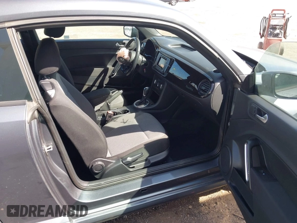2019 Volkswagen Beetle S with VIN 3VWFD7AT3KM707221, listed as a IAAI auction lot 41860730 with 35,885 mi miles and . Bid and sale history available at DreamBid. Image 5.