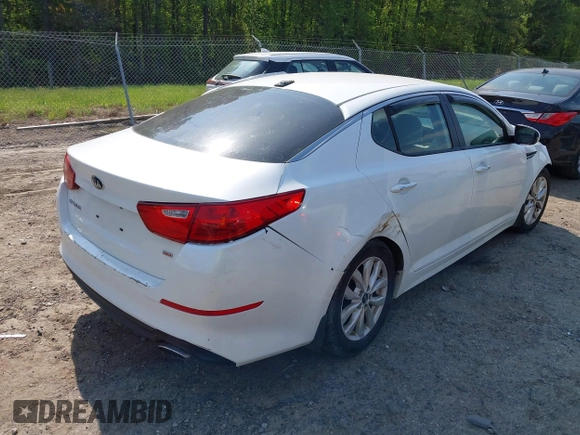 2014 Kia Optima LX with VIN KNAGM4A76E5454542, listed as a IAAI auction lot 42006510 with 192,291 mi miles and . Bid and sale history available at carsss.com. Image 4.