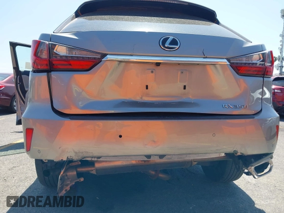 2018 Lexus RX 350 with VIN 2T2ZZMCA4JC115390, listed as a IAAI auction lot 42515866 with 51,760 mi miles and . Bid and sale history available at DreamBid. Image 6.